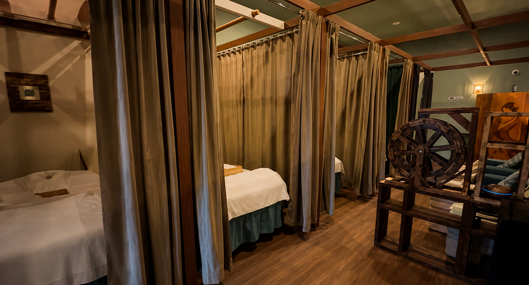 Candlelit treatment room at NuWa Massage & Beauty